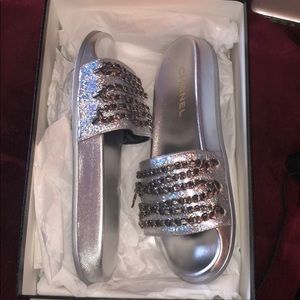 Silver, holographic Chanel slides
